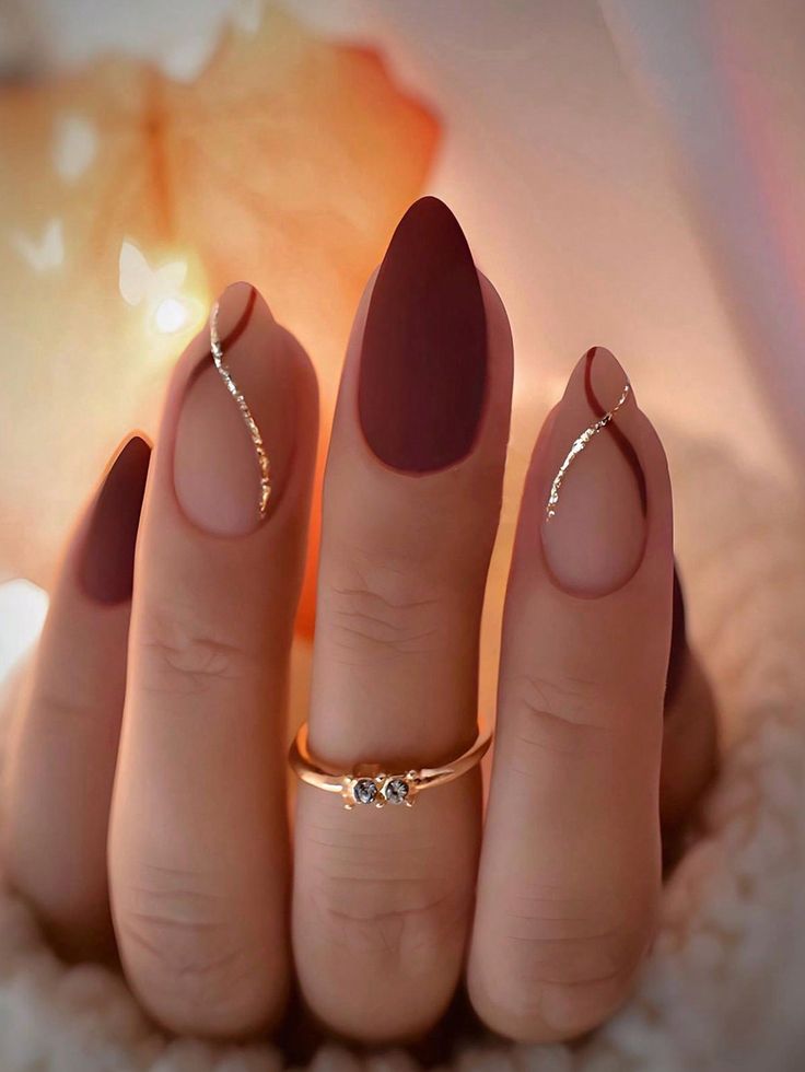 Almond Fall Nails: Trendy Designs for the Season 2024 1 Almond Fall Nail